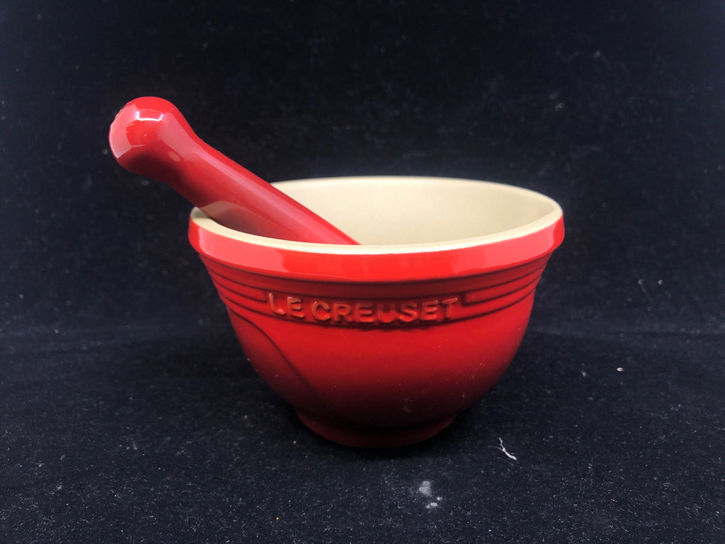 STONEWARE MORTAR AND PESTLE.