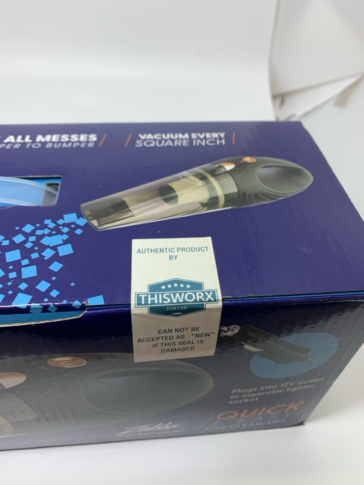 NIB CORED CAR VACUUM CLEANER.