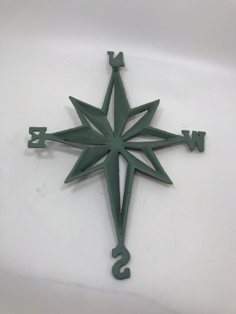 GREEN METAL WALL COMPASS.