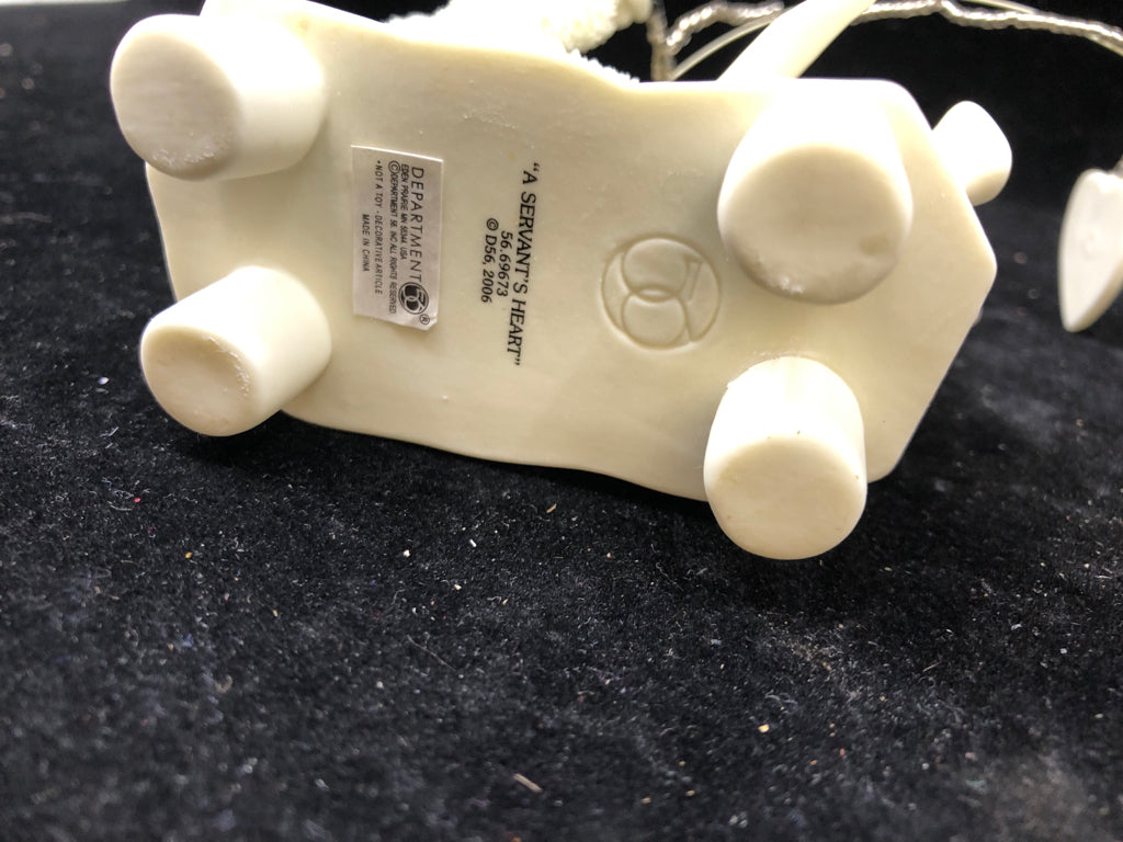 SNOW BABY A SERVANTS HEART HOLDING FISHING POLE.