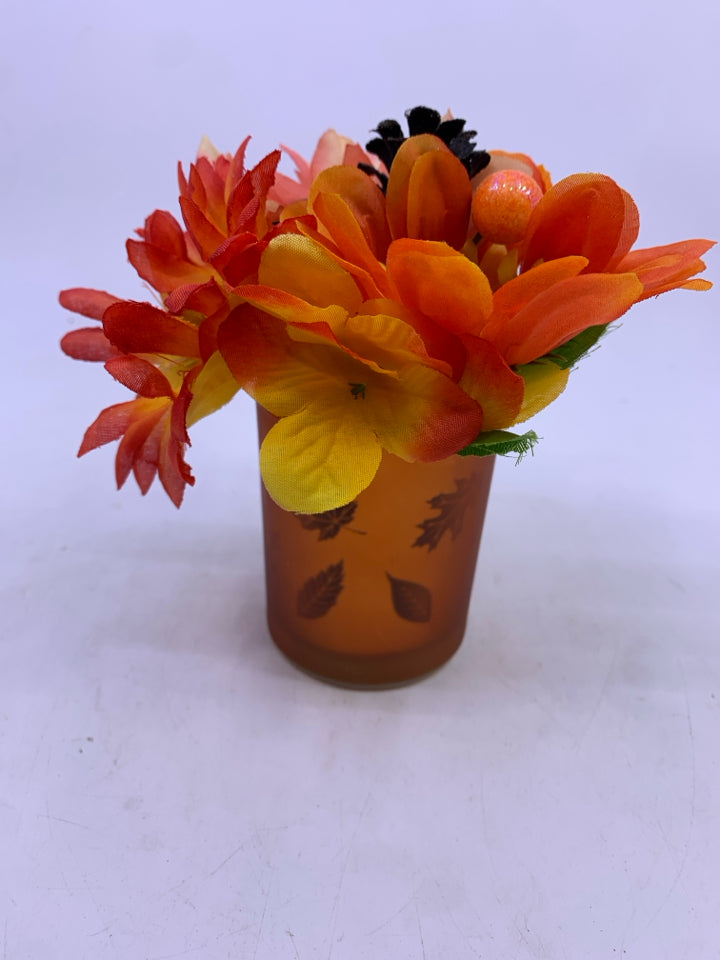 SMALL ORANGE FLORAL ARRANGEMENT.