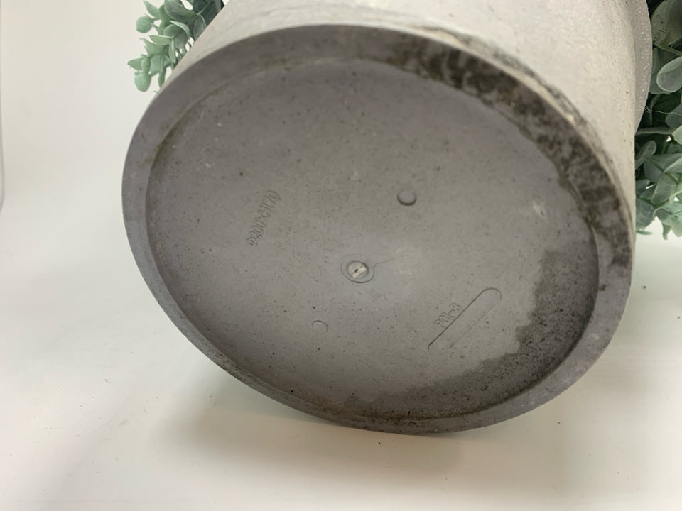FAUX GREENERY BUSH IN GREY PLASTIC POT.