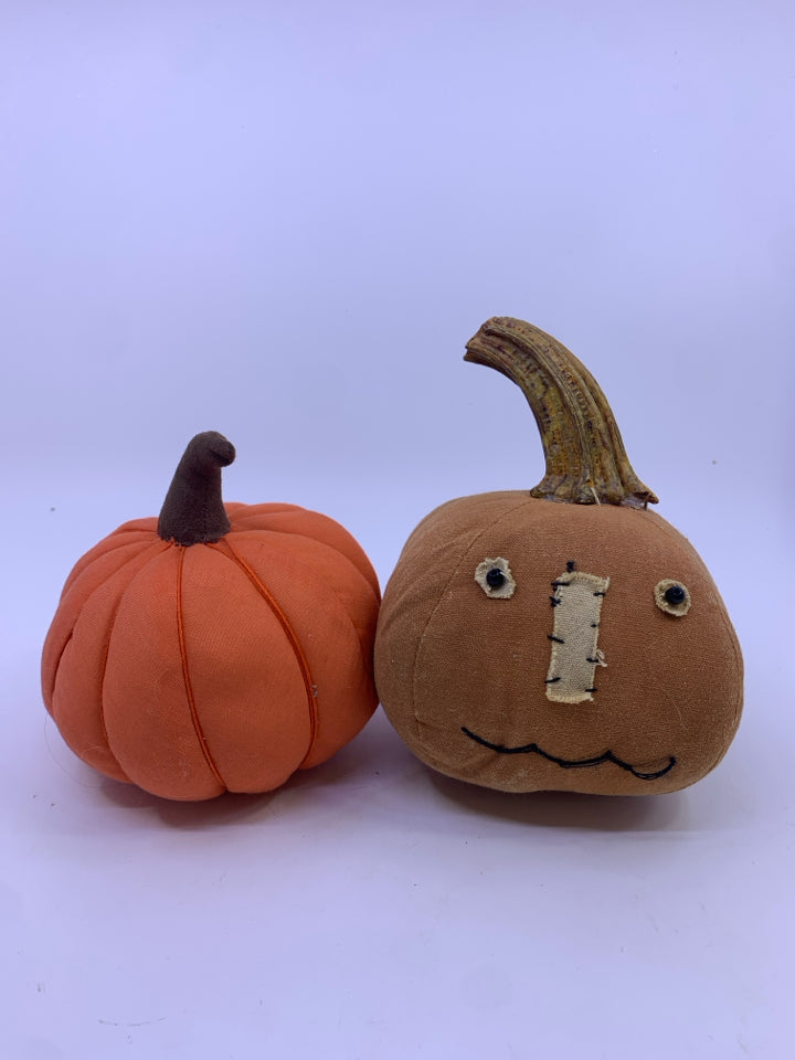 2 FABRIC PUMPKINS, ORANGE AND BROWN W/FACE.
