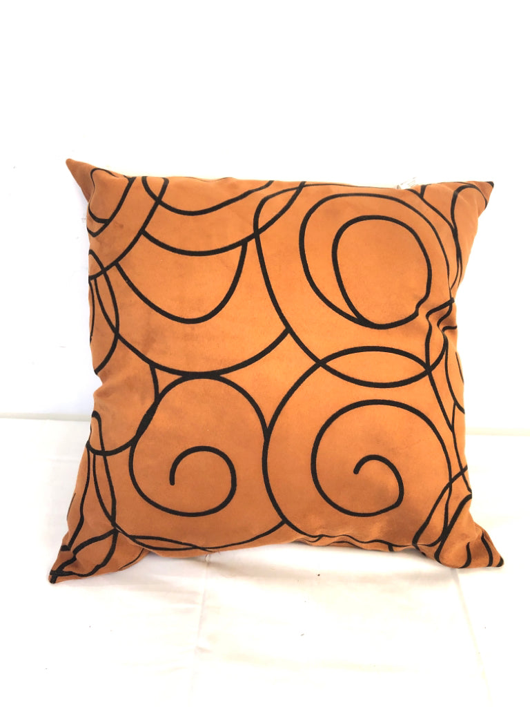 ORANGE W BLACK SCROLL PILLOW.