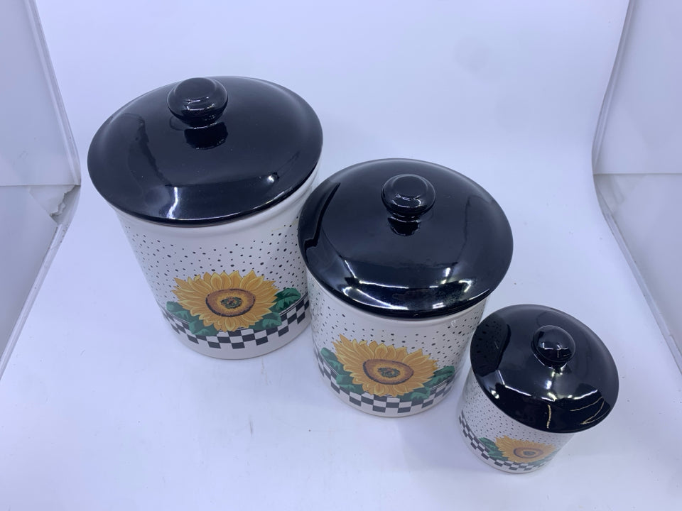 3 SUNFLOWER CANISTER W/ BLACK LIDS.