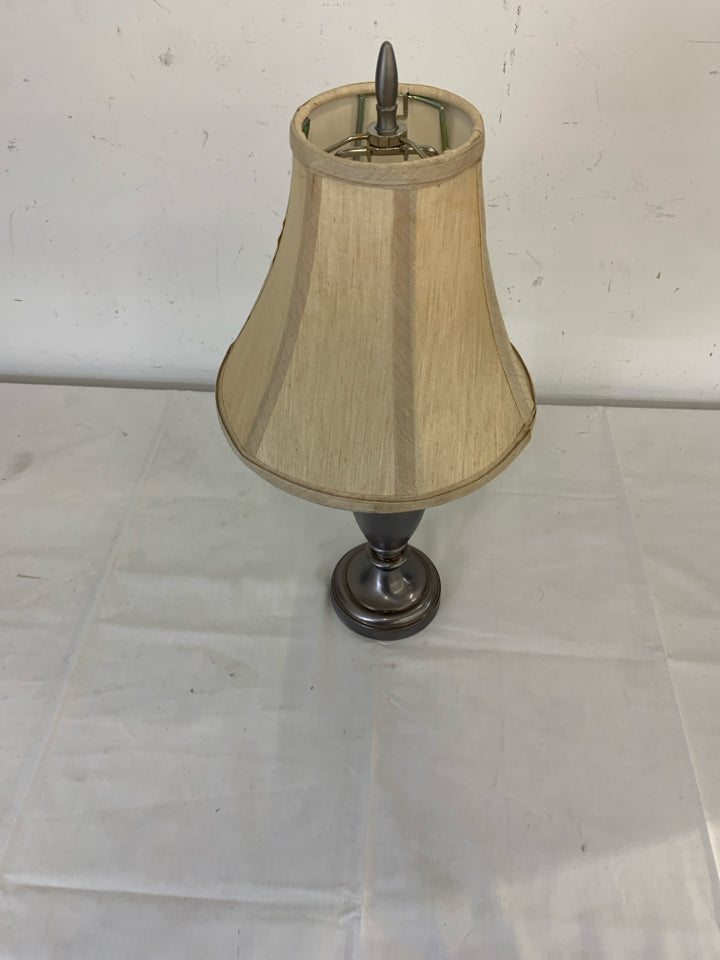 SHORT SILVER BASE LAMP W/ CREAM+TAN SHADE.