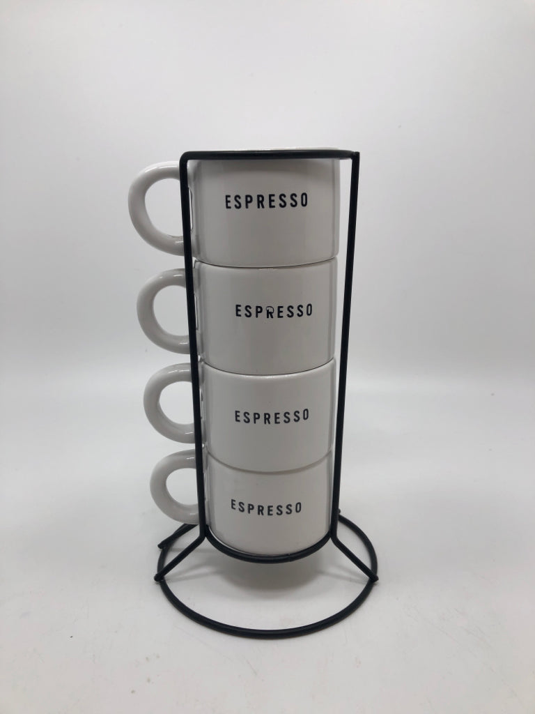 4 STACKED ESPRESSO CUPS IN BLACK HOLDER.