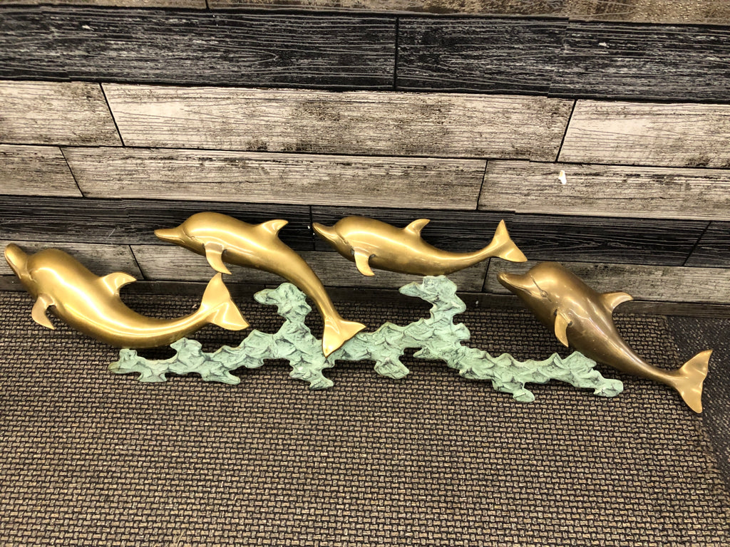 LARGE BRASS DOLPHINS WALL HANGING.
