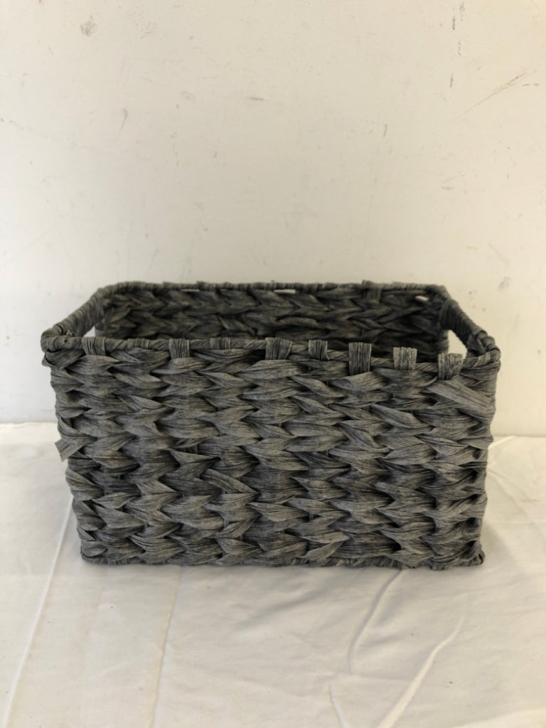 GREY WICKER BASKET.