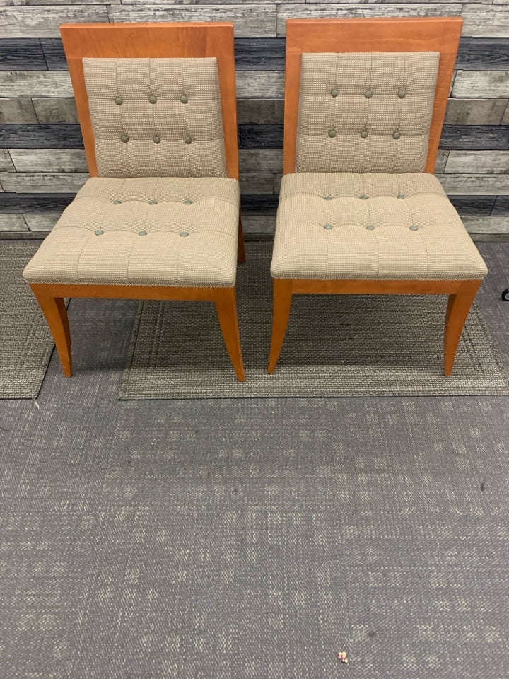 2 WOOD BASE ACCENT CHAIRS W GREEN AND CREAM PADDING.