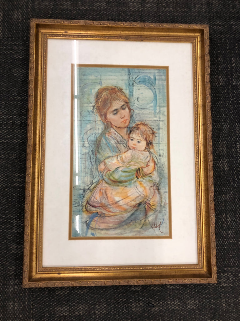WOMAN HOLDING CHILD.