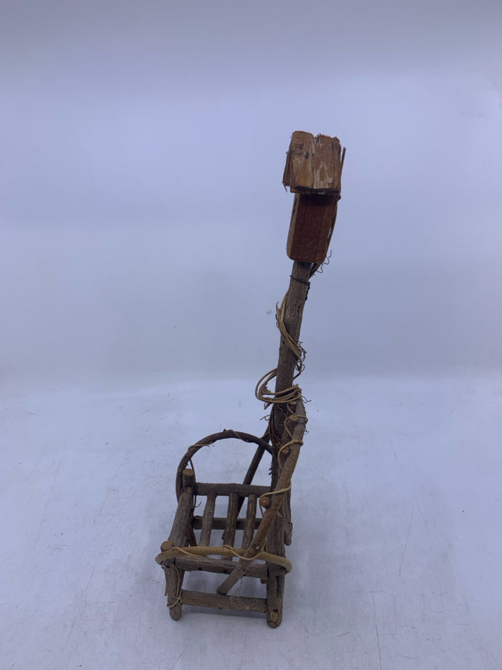 SMALL STICK CHAIR W/ BIRD HOUSE.