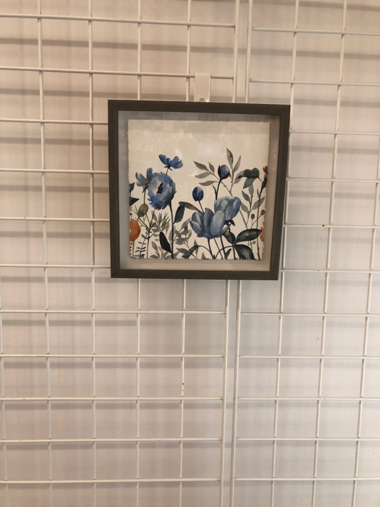 BLUE PAINTED FLORALS IN SM GRAY FRAME.