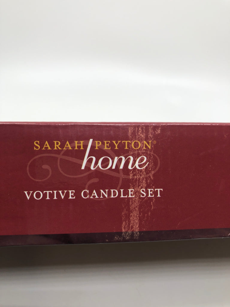 NIB VOTIVE CANDLE SET.