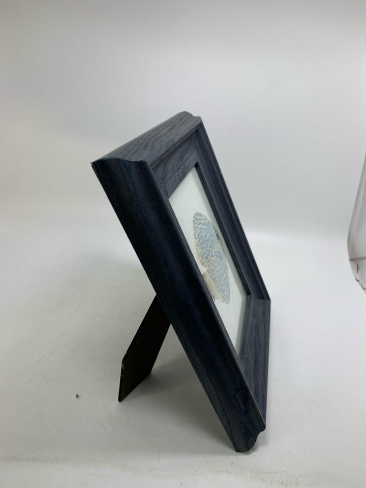 NAVY BLUE FRAME W/ FISH PICTURE.