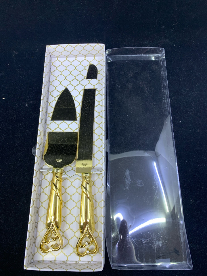 2pc NIB GOLD CAKE SERVER SET.