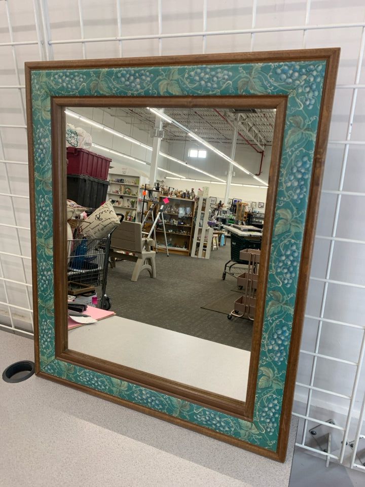 MIRROR W/GRAPES/LEAVES DETAILED WOODEN FRAME.