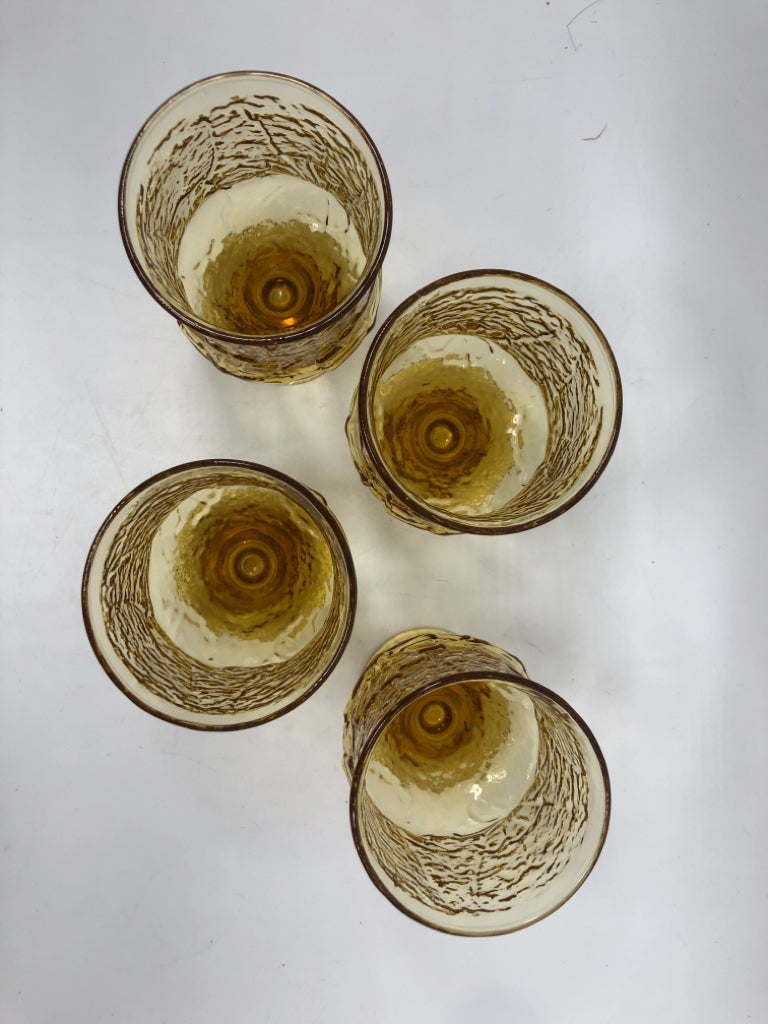 4 VTG AMBER GLASS FLORAL ETCHED GOBLETS.