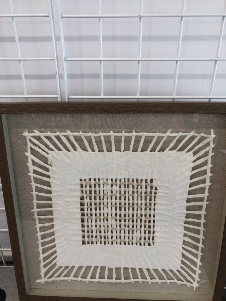 WOVEN PAPER DECOR IN BROWN FRAME.