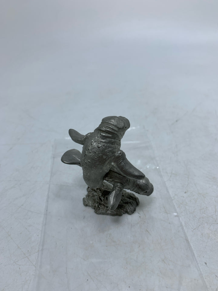 PEWTER DOUBLE MANTEE FIGURINE.