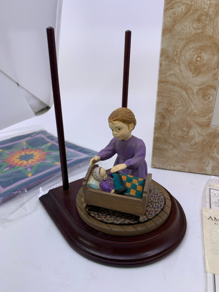 GIRL WITH DOLL IN CRADLE- AMISH HERITAGE COLLECTION.