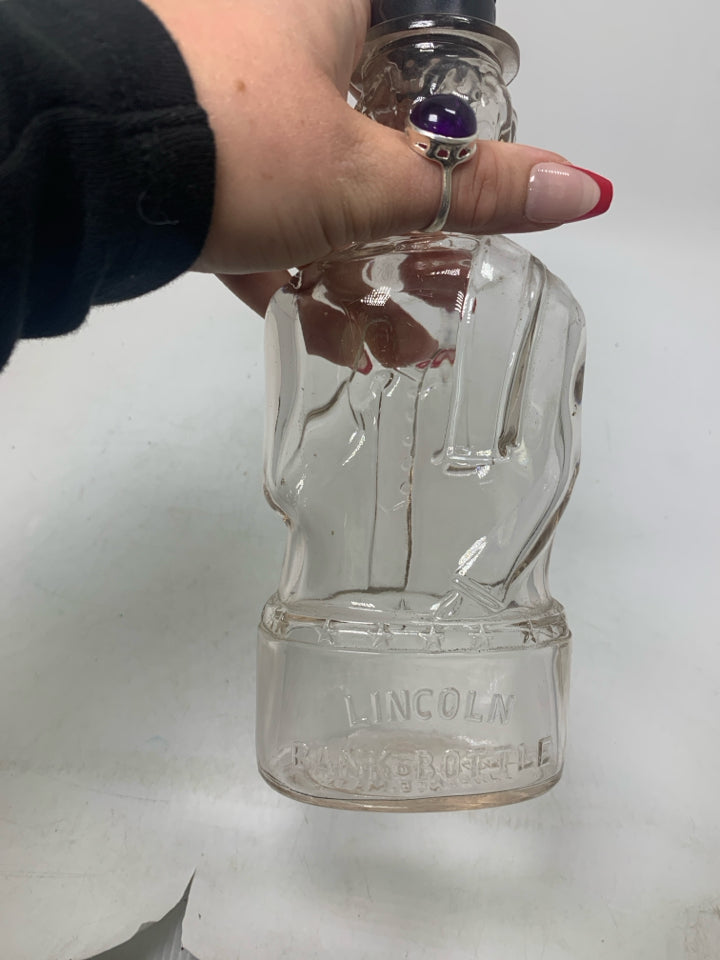 VTG ABRAHAM LINCOLN GLASS BOTTLE BANK.