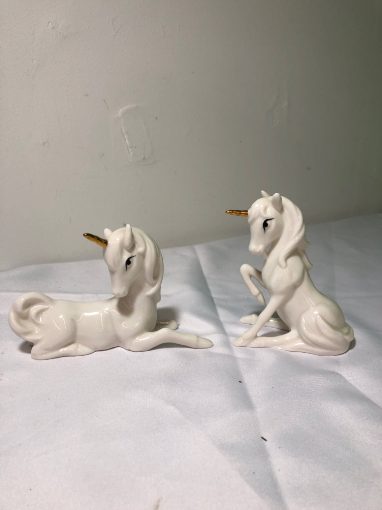 2 WHITE UNICORNS.