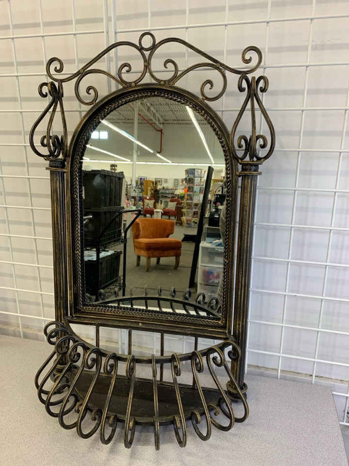 BAROQUE STYLE ARCHED METAL WALL MIRROR W ANTIQUE BRASS FINISH.