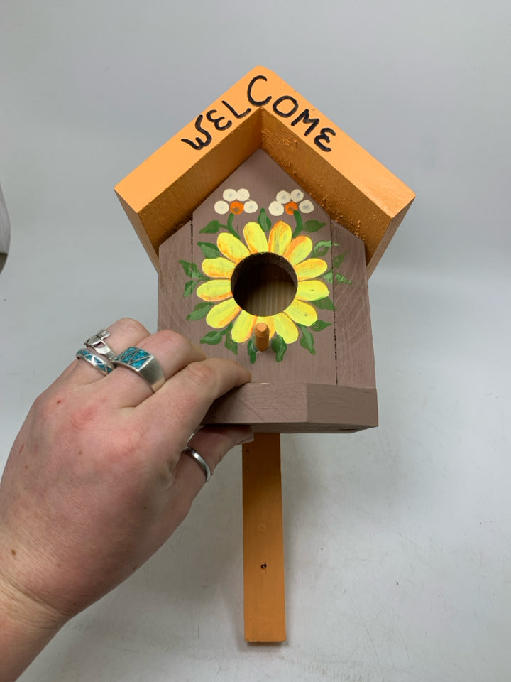 ORANGE/BROWN WOOD BIRD HOUSE.