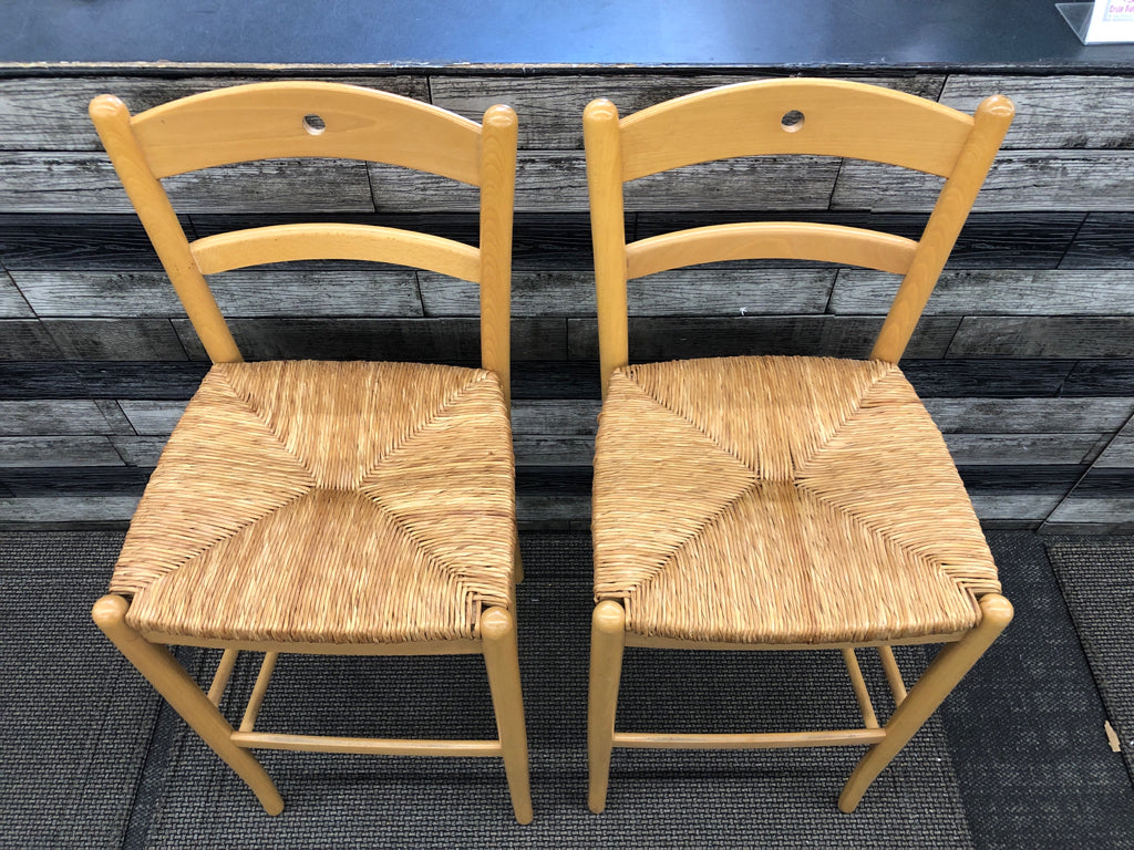 2 BLONDE BAR STOOLS W/ WICKER SEATS.