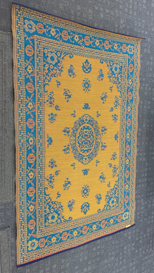 BLUE/ORANGE MAD MATS REVERSIBLE INDOOR OUTDOOR RUG.
