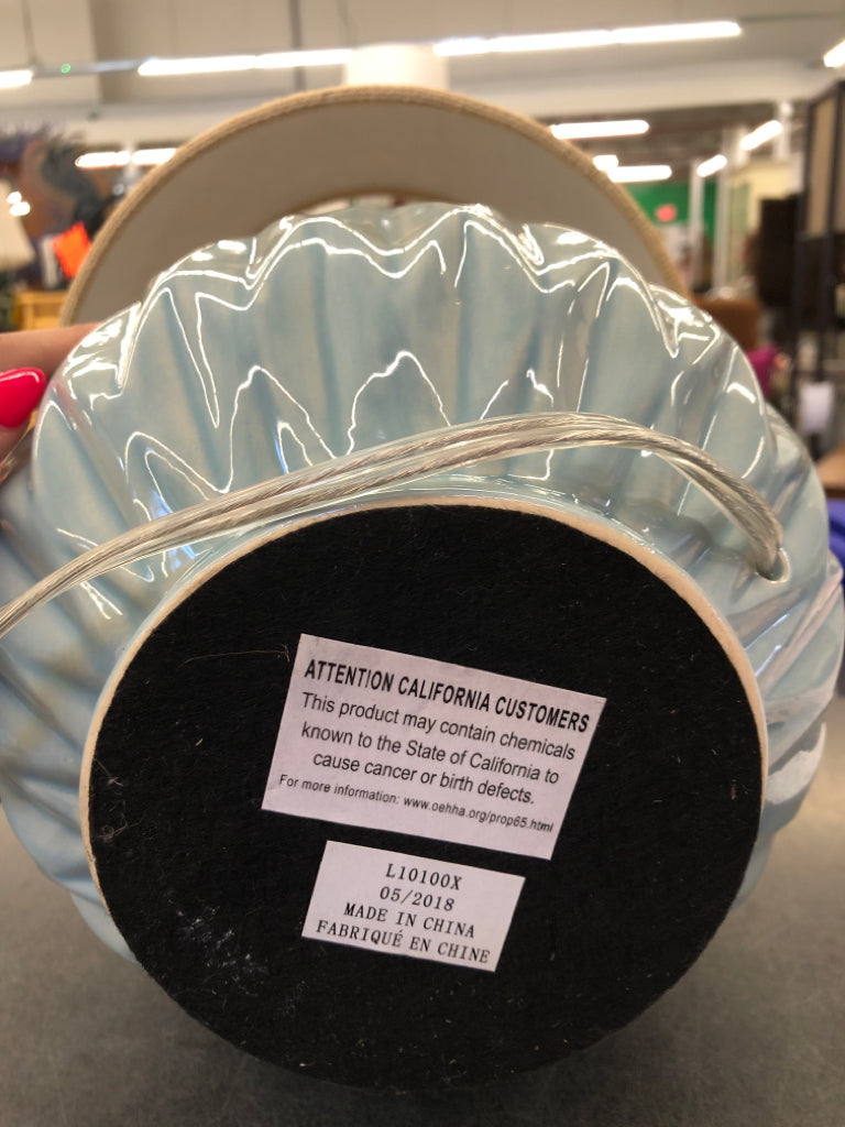 ROUND TEAL LAMP W TAN SHADE.