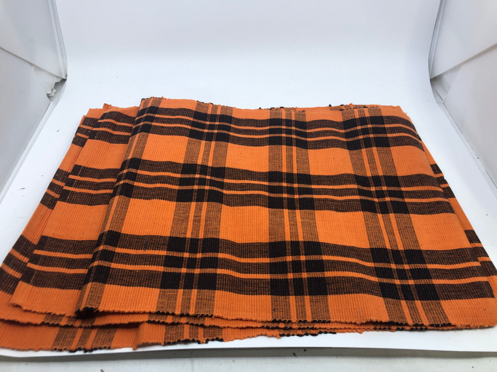 4 BLACK AND ORANGE PLAID PLACEMATS.