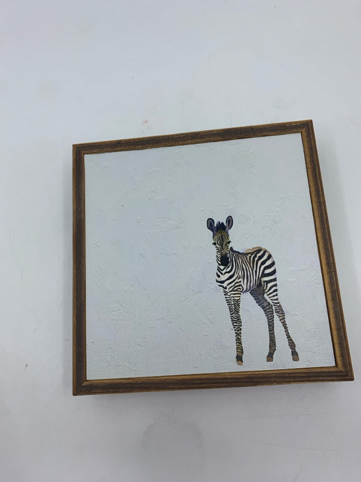 ZEBRA IN WOOD FRAME WALL HANGING.