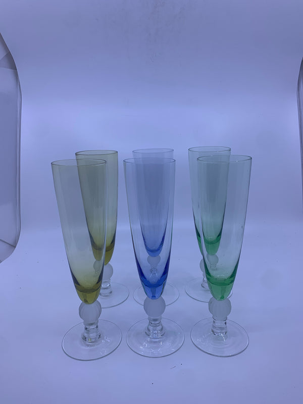 6 MULTI-COLORED FOOTED FROSTED BALL CHAMPAGNE FLUTES.