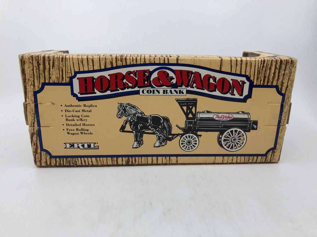 NIB TRUE VALUE HORSE AND WAGON COIN BANK.