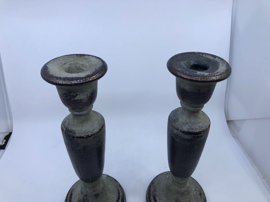 2 RUSTIC TAPER CANDLESTICK HOLDERS.
