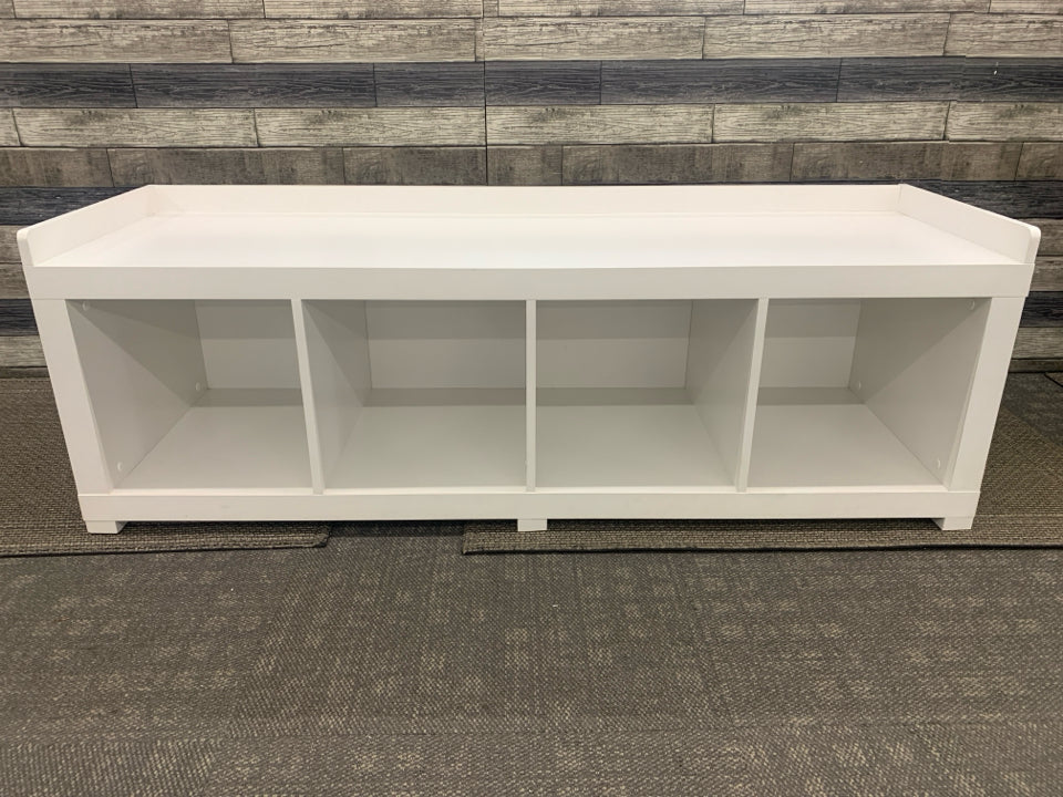 WHITE SHOE BENCH WITH CUBBIES .