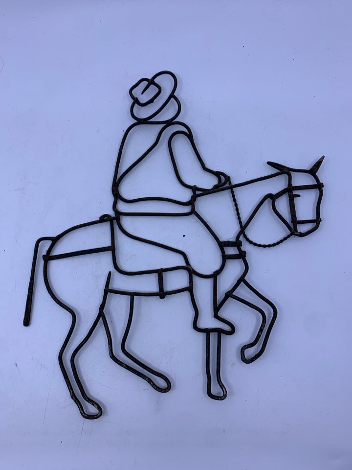 METAL COWBOY WALL ART.