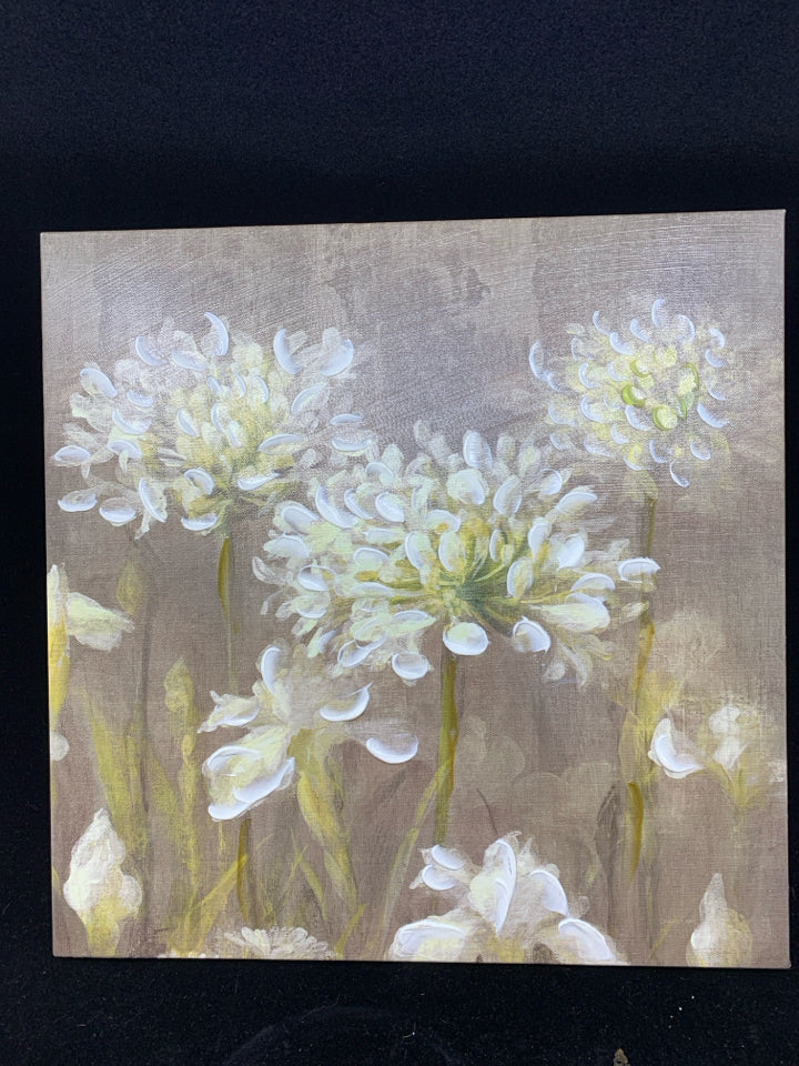 BROWN CANVAS WITH WHITE FLOWERS WALL HANGING.