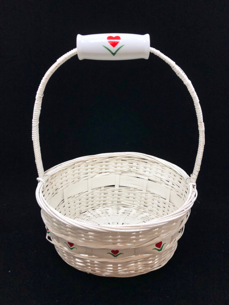 WHITE PAINTED BASKET W/ HEART FLOWER DESIGN.