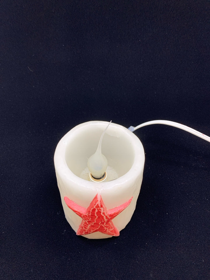 PRIMITIVE RED STAR FAUX LIGHT UP CANDLE.