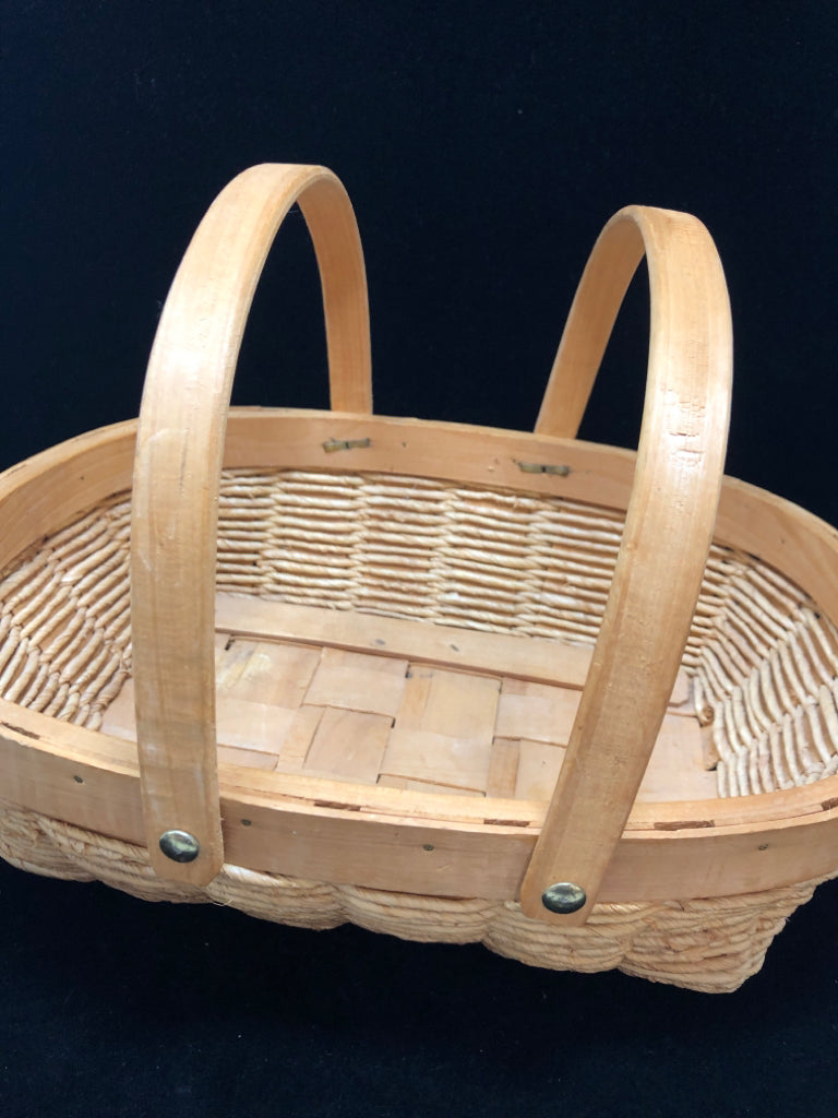 WOVEN BASKET W/2 WOODEN HANDLES.