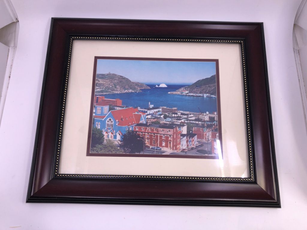 DARK CHERRY WOOD FRAME W/ CITY BY THE WATER SCENE.