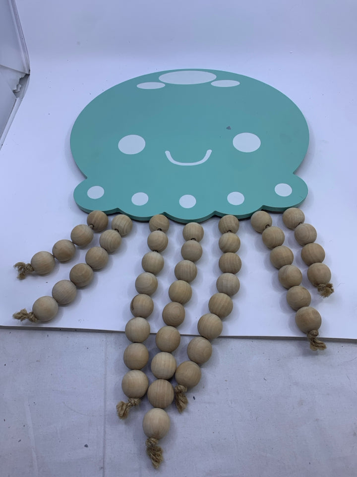 TEAL JELLY FISH W BEADS.