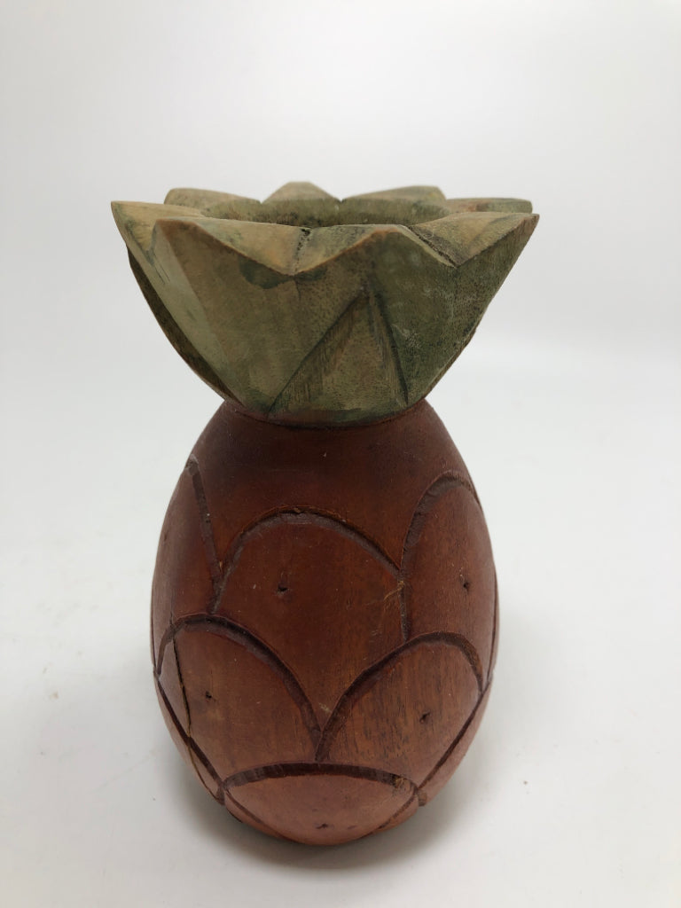 HAND-CARVED WOODEN PINEAPPLE CANDLE HOLDER W/GREEN LEAVES.