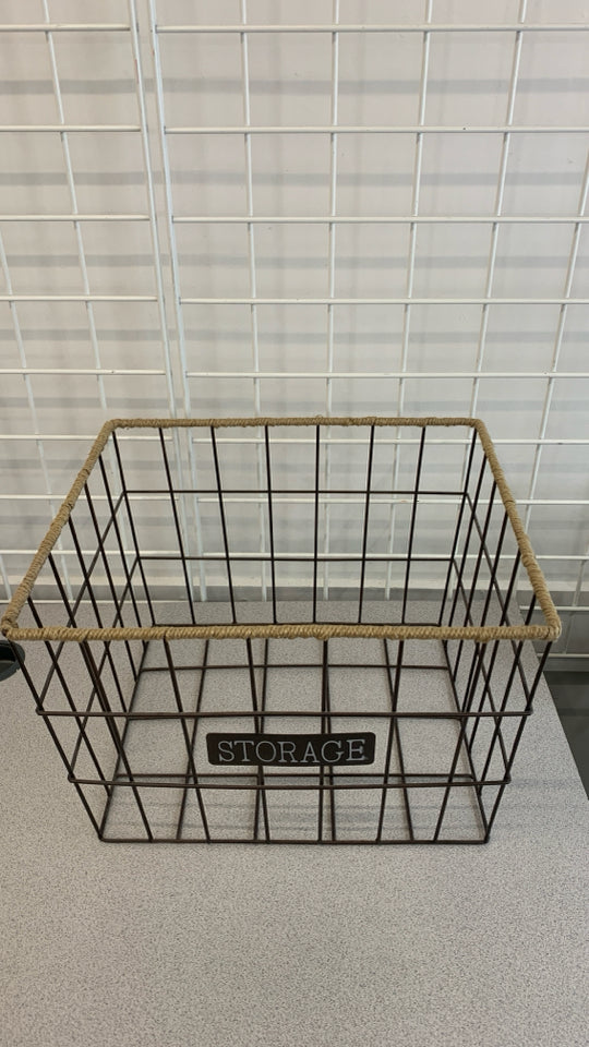 BROWN METAL STORAGE BASKET W/TWINE WRAPPED EDGE.