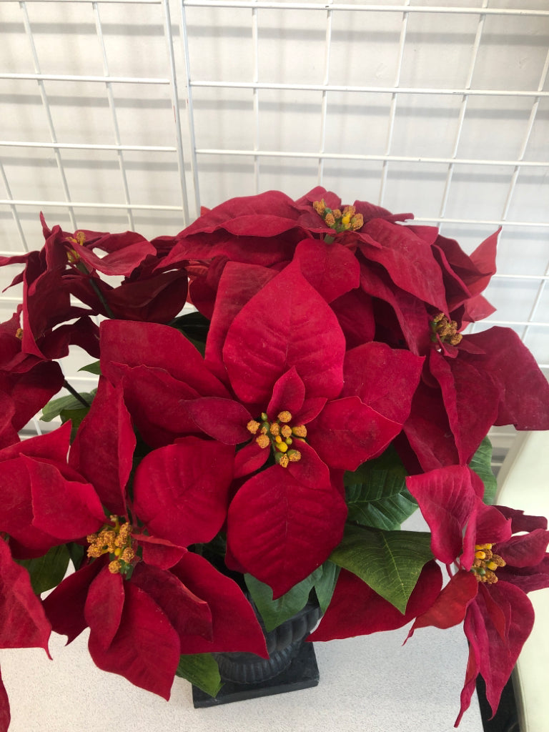FAUX POINSETTIA IN HEAVY CERAMIC PLANTER.