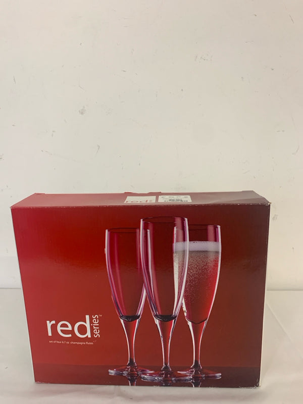 4 RED SERIES CHAMPAGNE FLUTES.