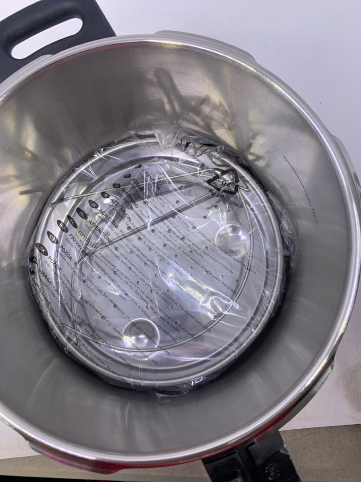 NEW FAGOR STAINLESS STEEL PRESSURE COOKER.